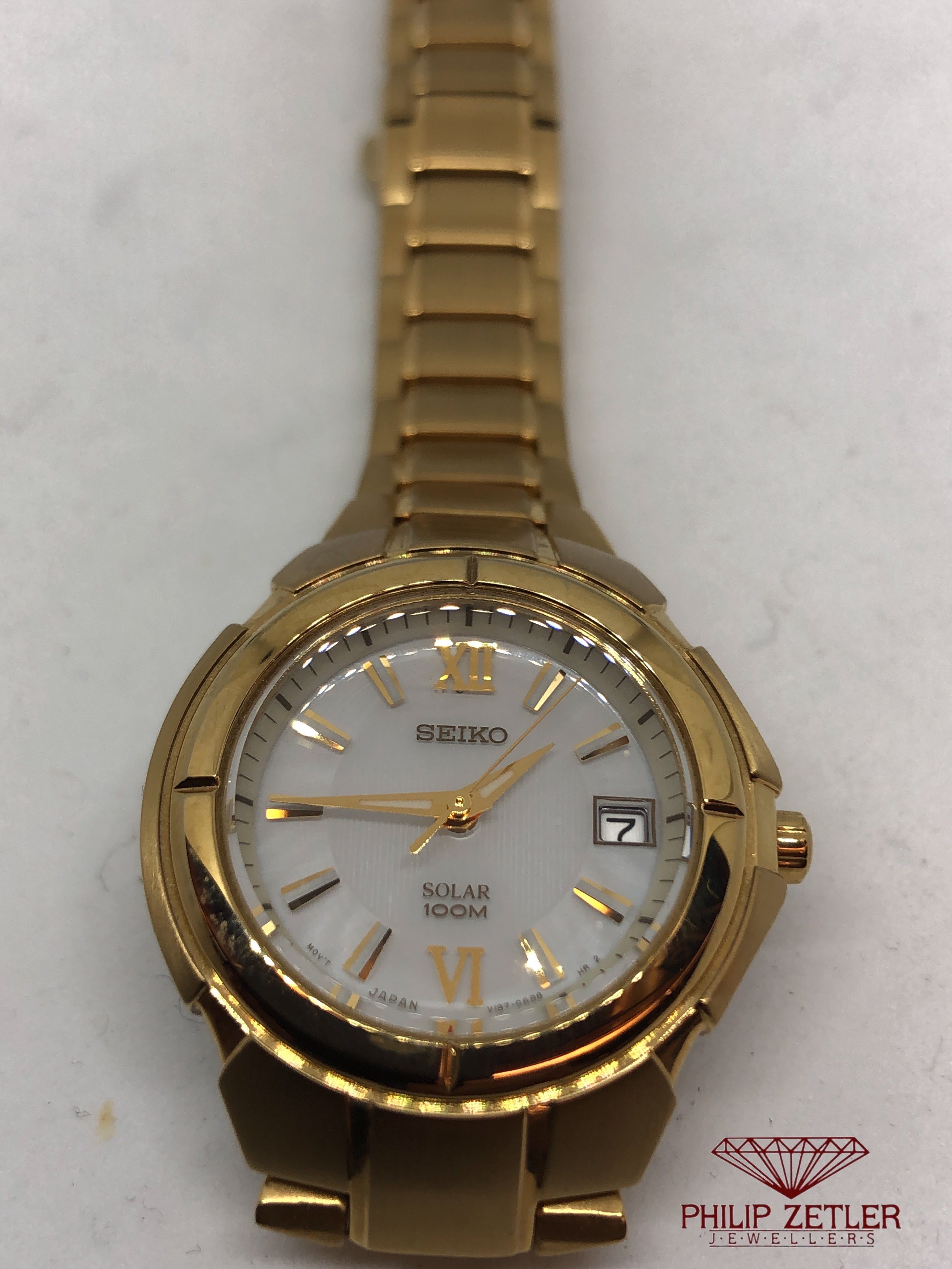 Seiko solar 100m discount gold